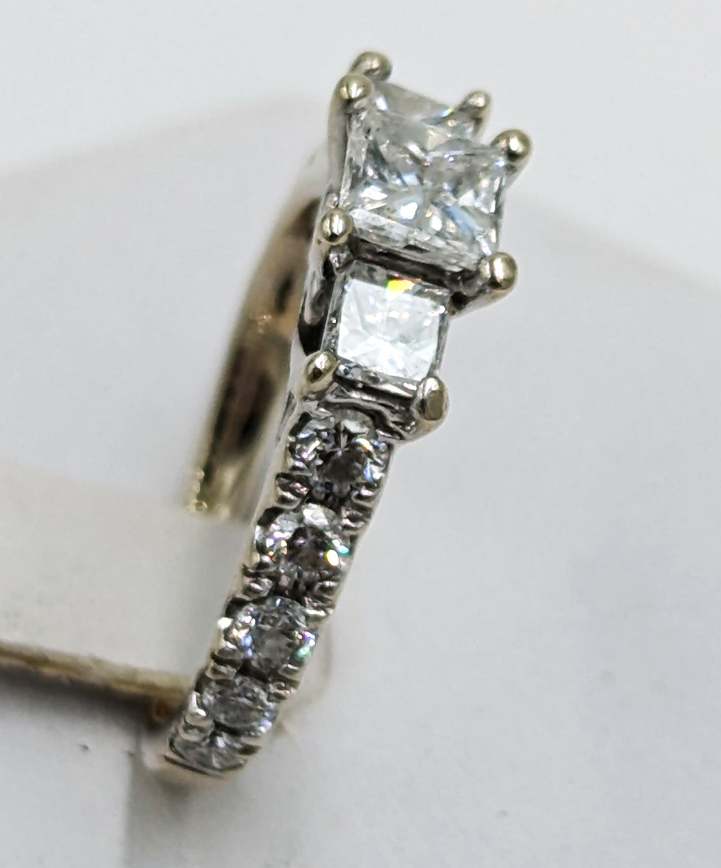 10Kt White Gold ring with centerd square cut diamonds