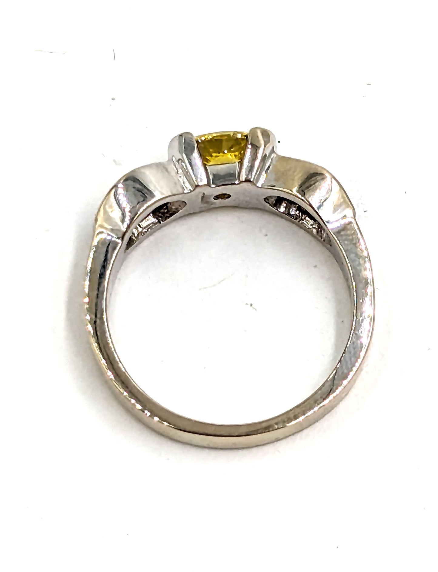 18Kt White Gold Ring with centered fancy vivid yellow diamond